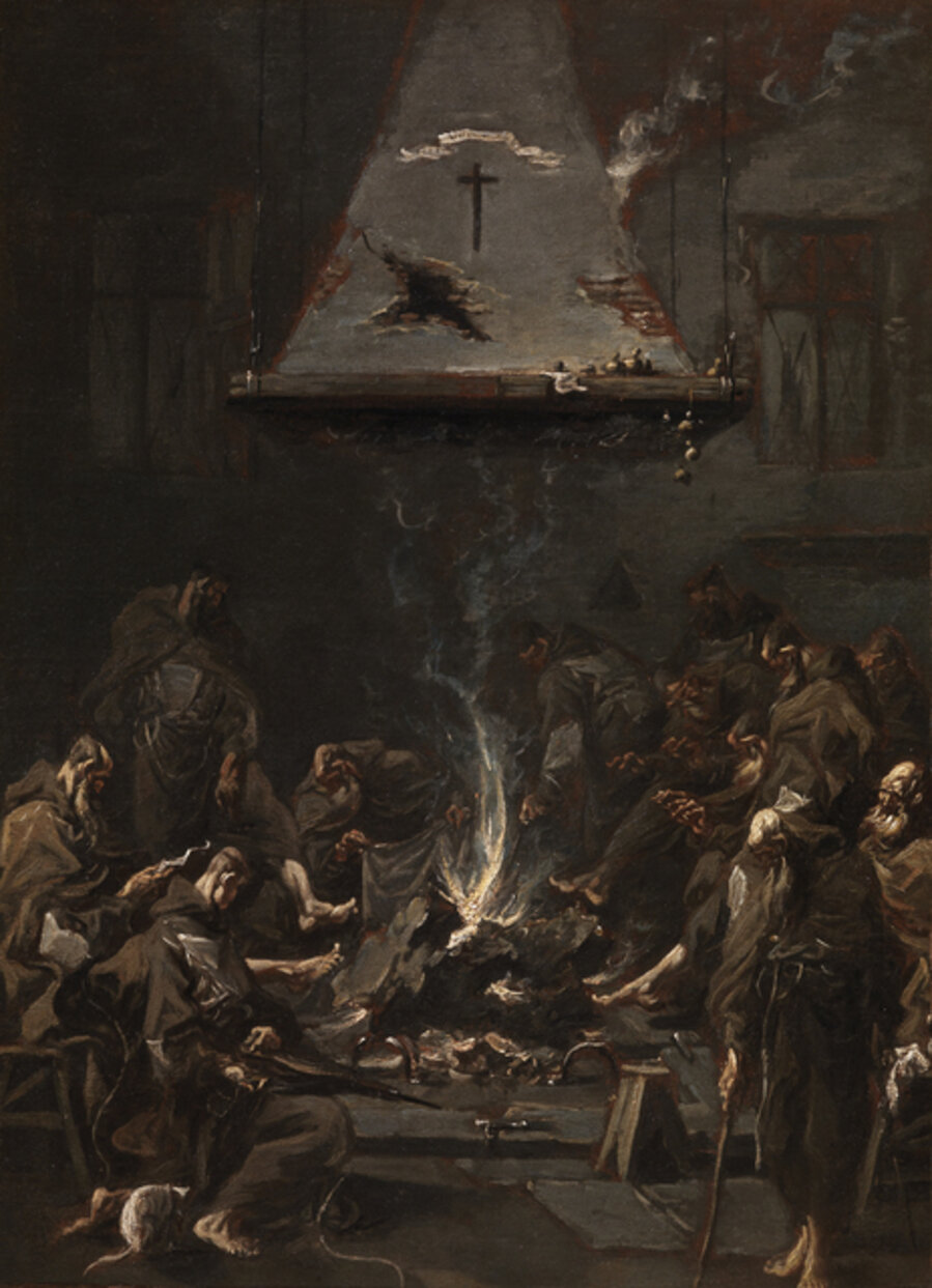 MONKS WARMING THEMSELVES AT THE FIRE