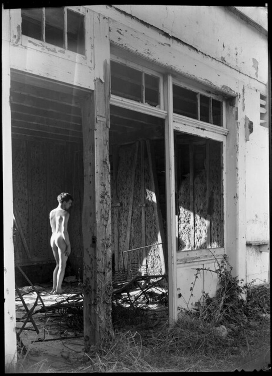 Guy Bourdin (1928-1991) in ruins, Saint-Aubin-sur-Mer, Normandy, France
