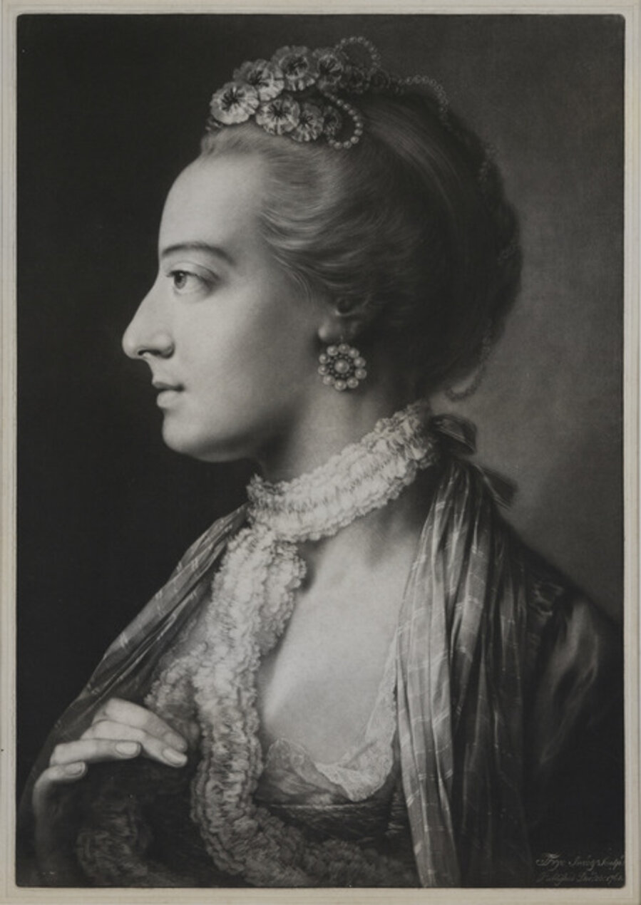 Fashionable Woman wearing a lace necklet.