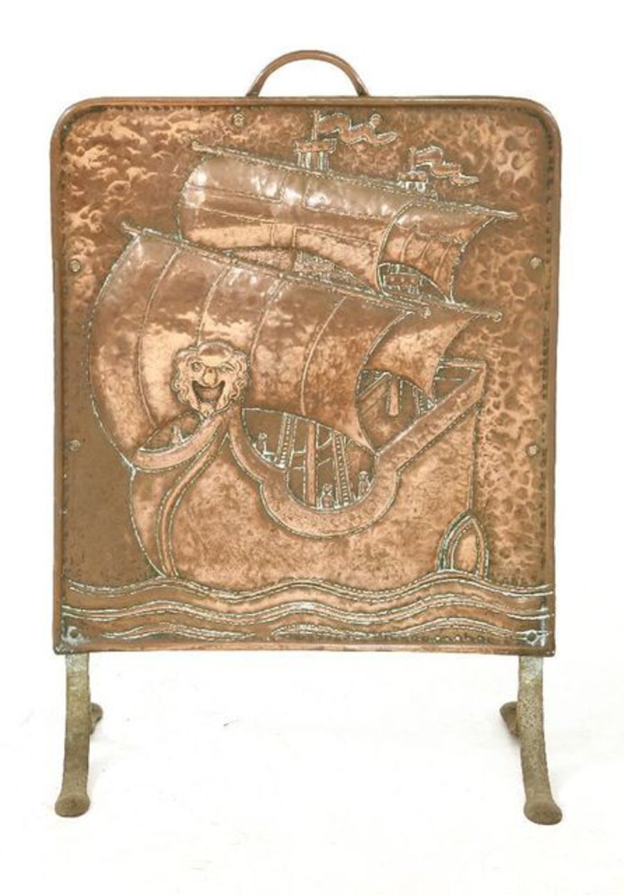 An Arts and Crafts copper fire screen