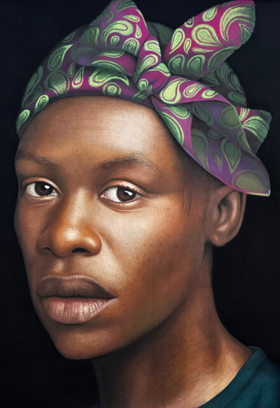 Young man with purple/green scarf