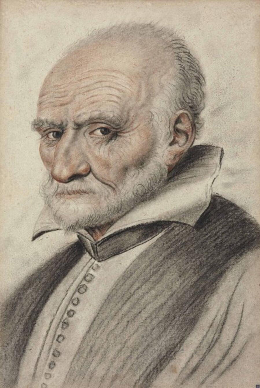 Portrait of a bearded man, bust-length, in three-quarter profile facing left