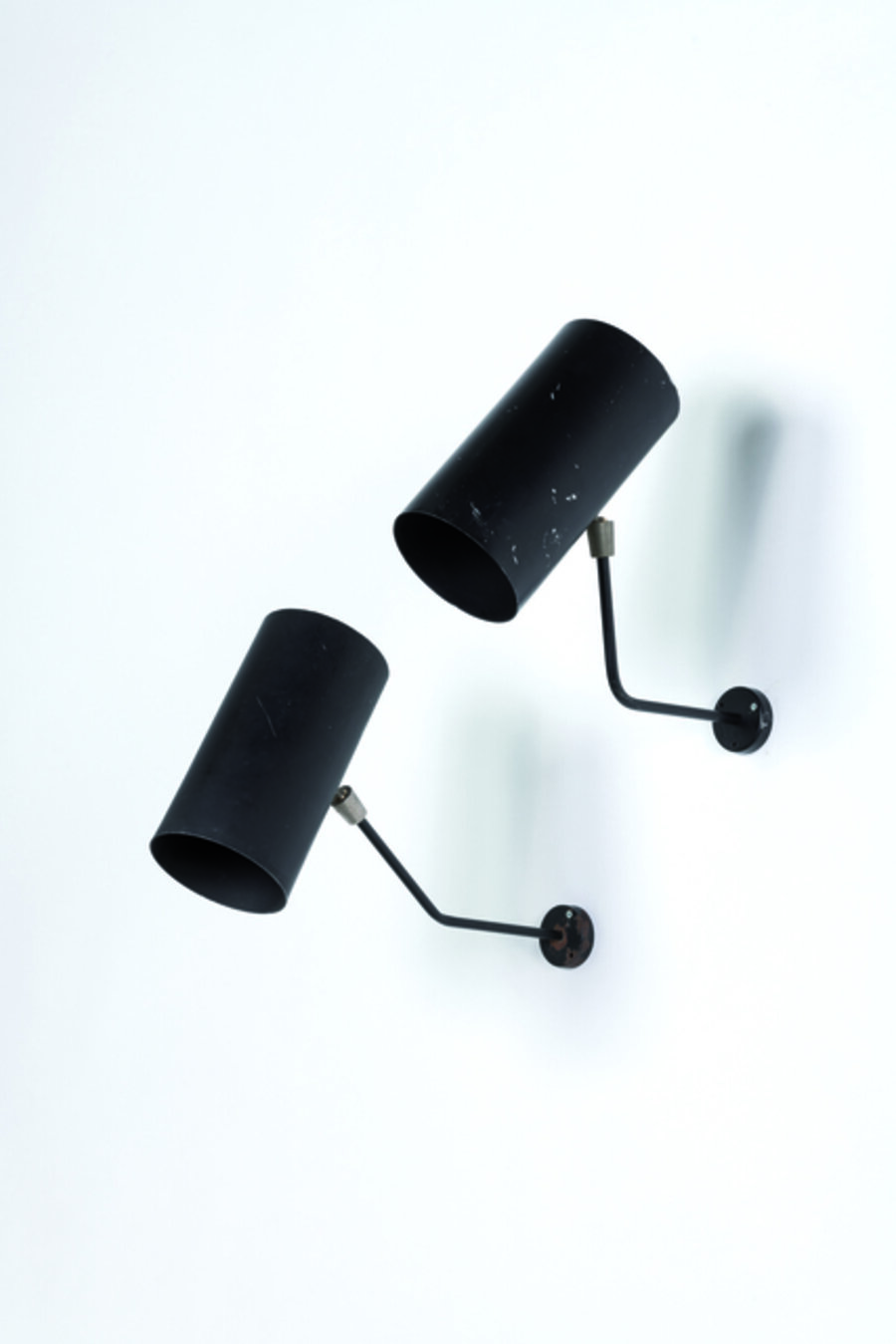 two wall lights in metal