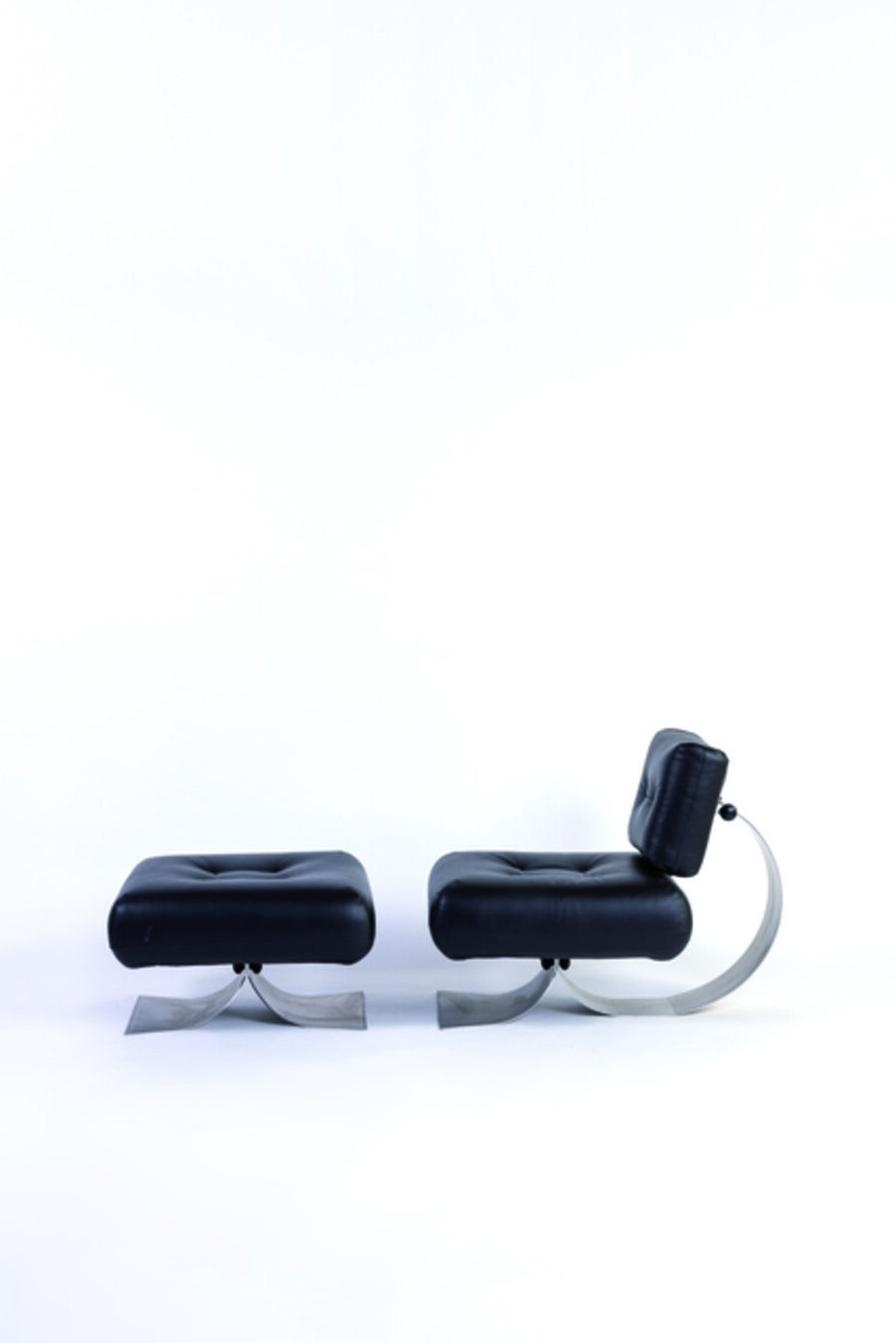 Alta armchair and ottoman in steel, plastic and leather