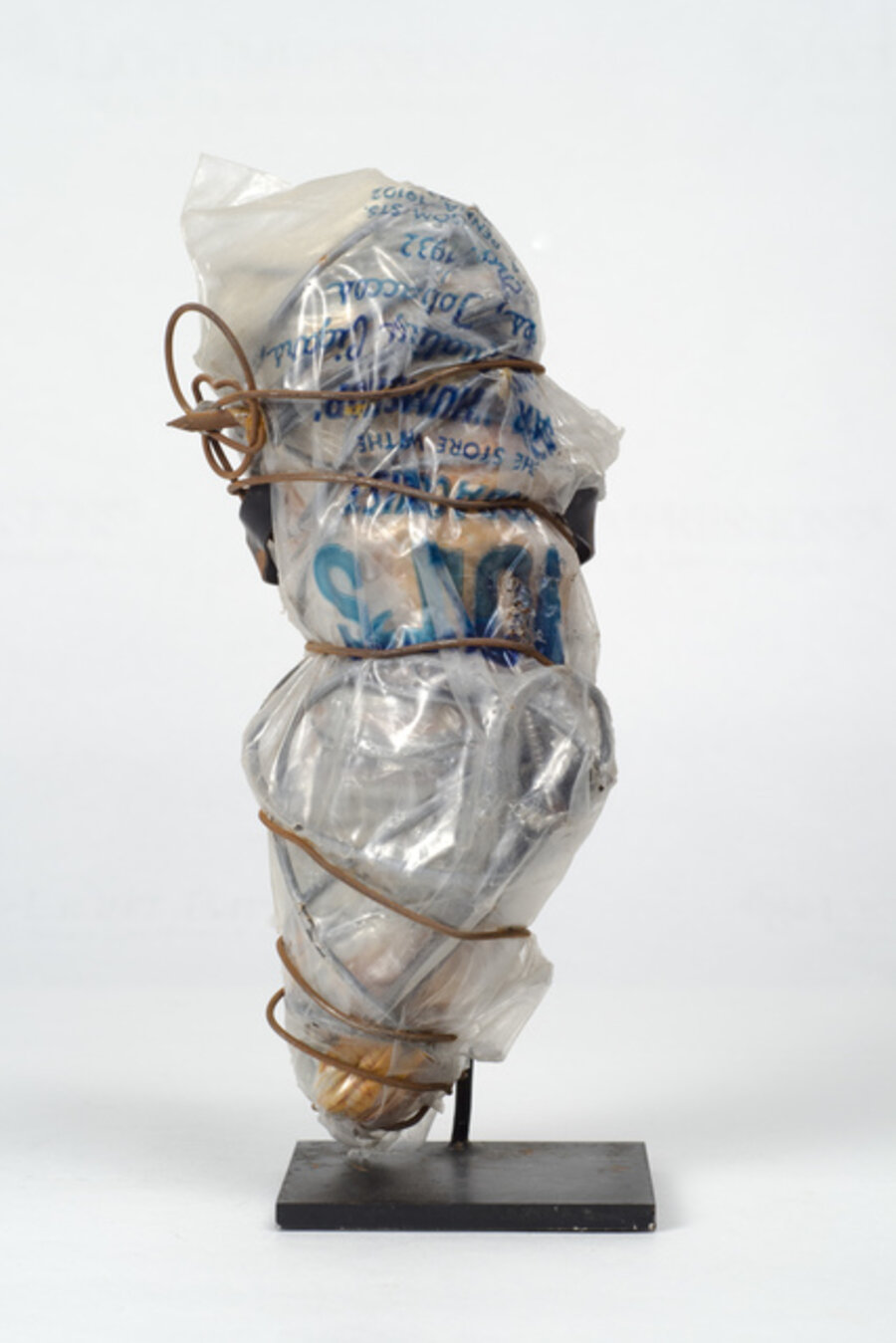 Untitled (plastic bag with blue writing)