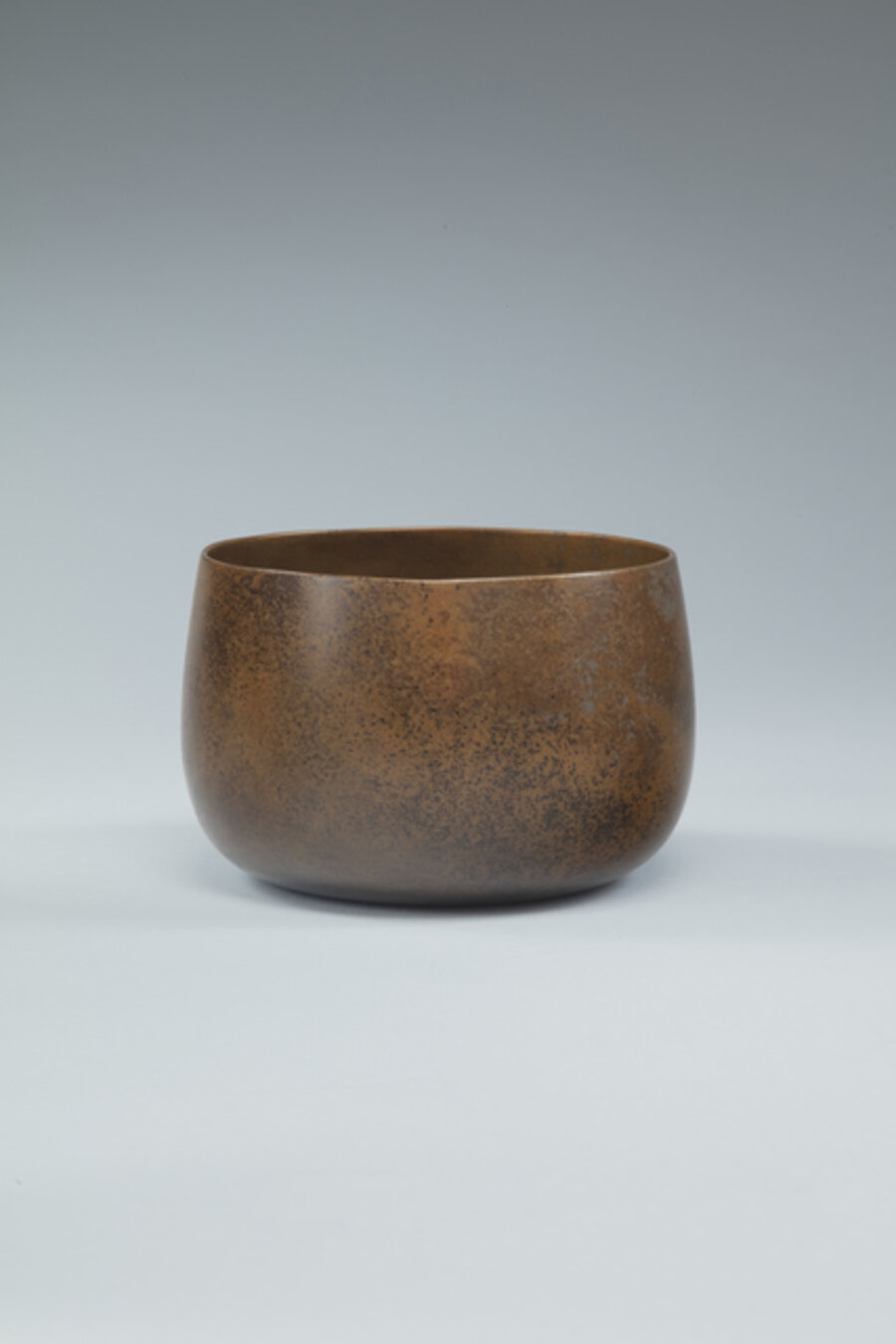 Waste-water bowl with simulated bronze surface