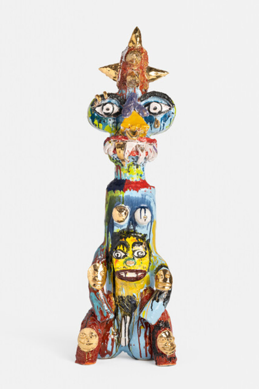 Seated Figure with Spike Headpiece
