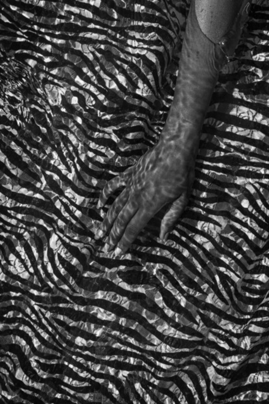 Untitled from Mama’s Clothes Series (Submerged Hand)
