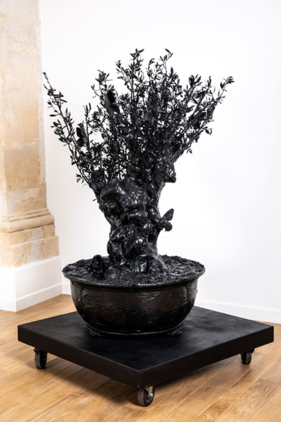 circle black bronze tree with butterflies