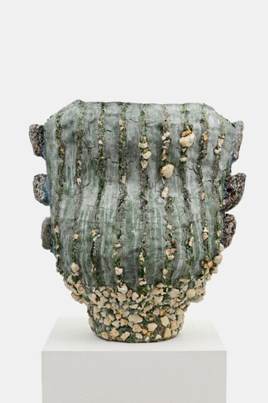 Vessel fused with stone