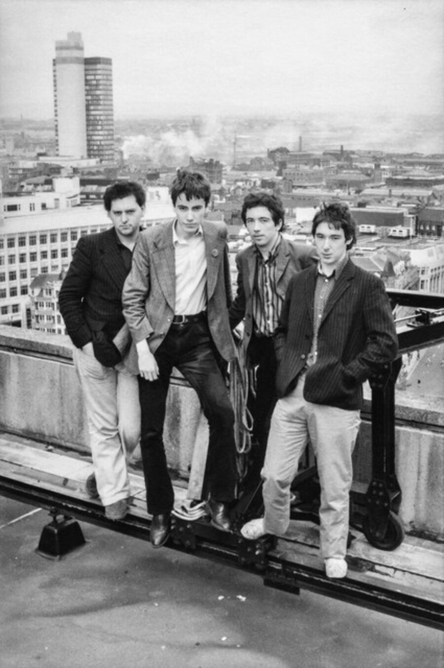 The Buzzcocks. Garth Smith (bass), John Maher (drums), Pete Shelly (vocals, guitar), Steve Diggle (guitar). Manchester