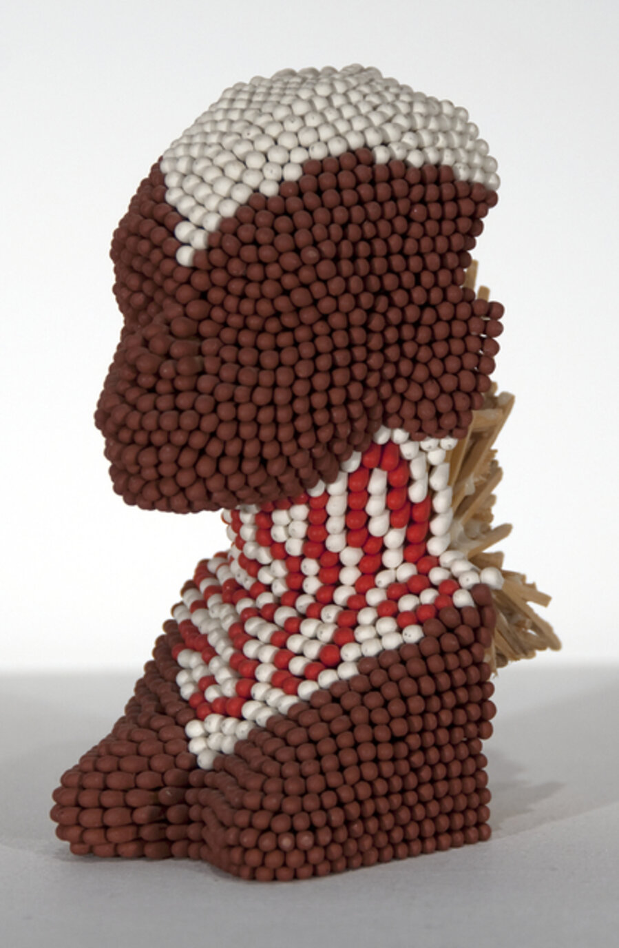 Matchstick Head, (small brown with neck and head design)