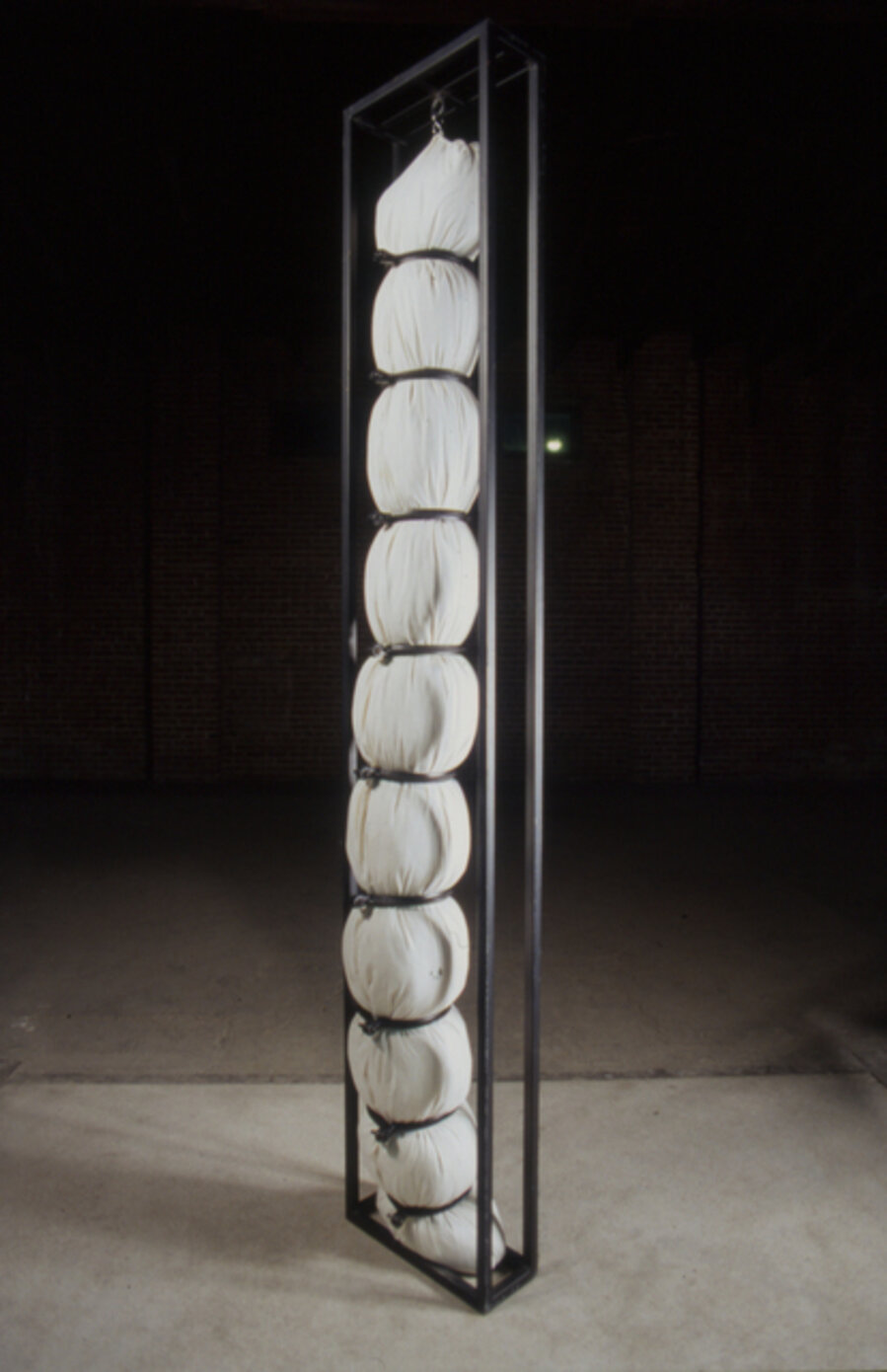 Soft Column. (Three bodies swings in a warehouse).