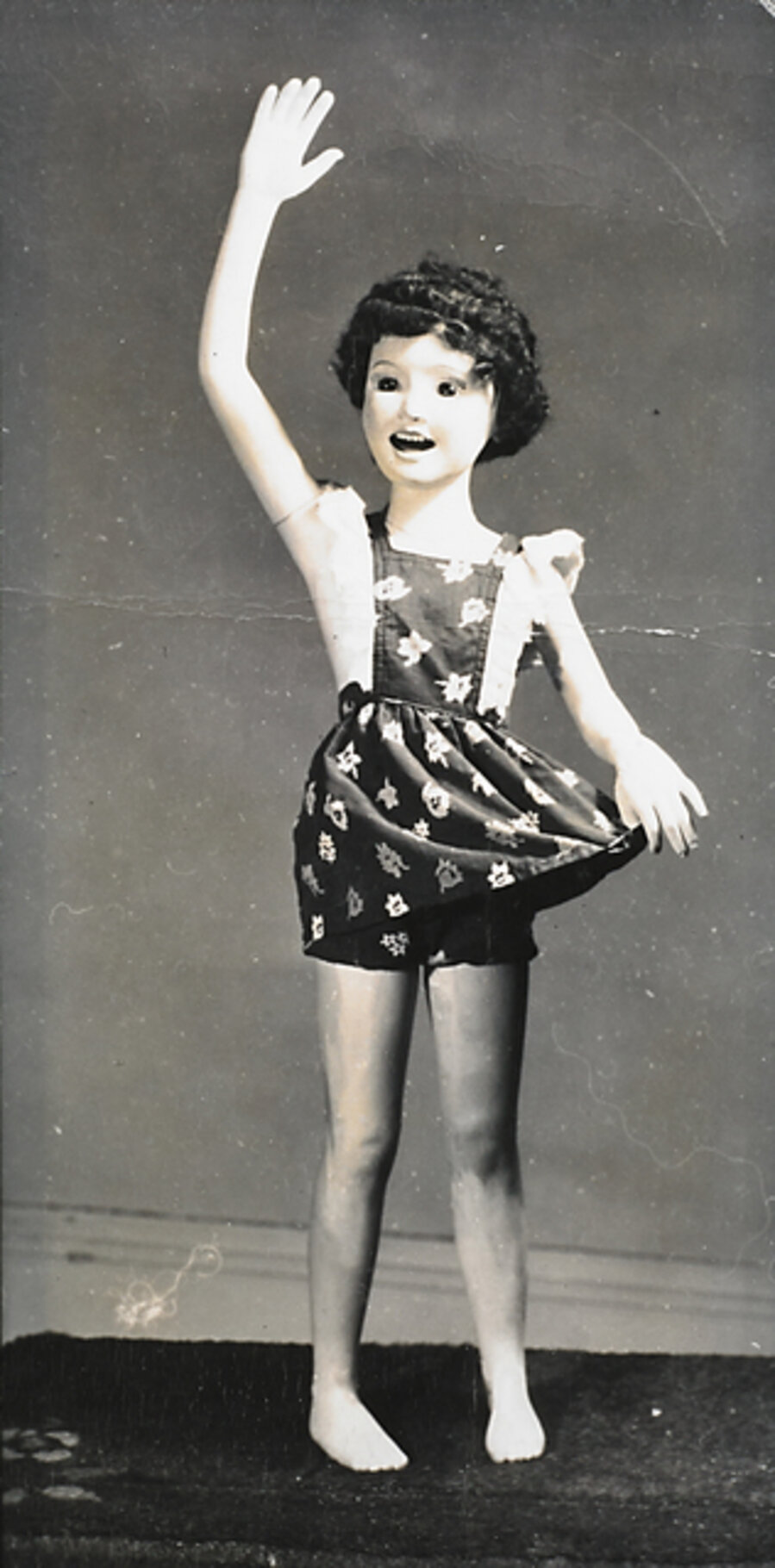 Waving Girl in Pinafore