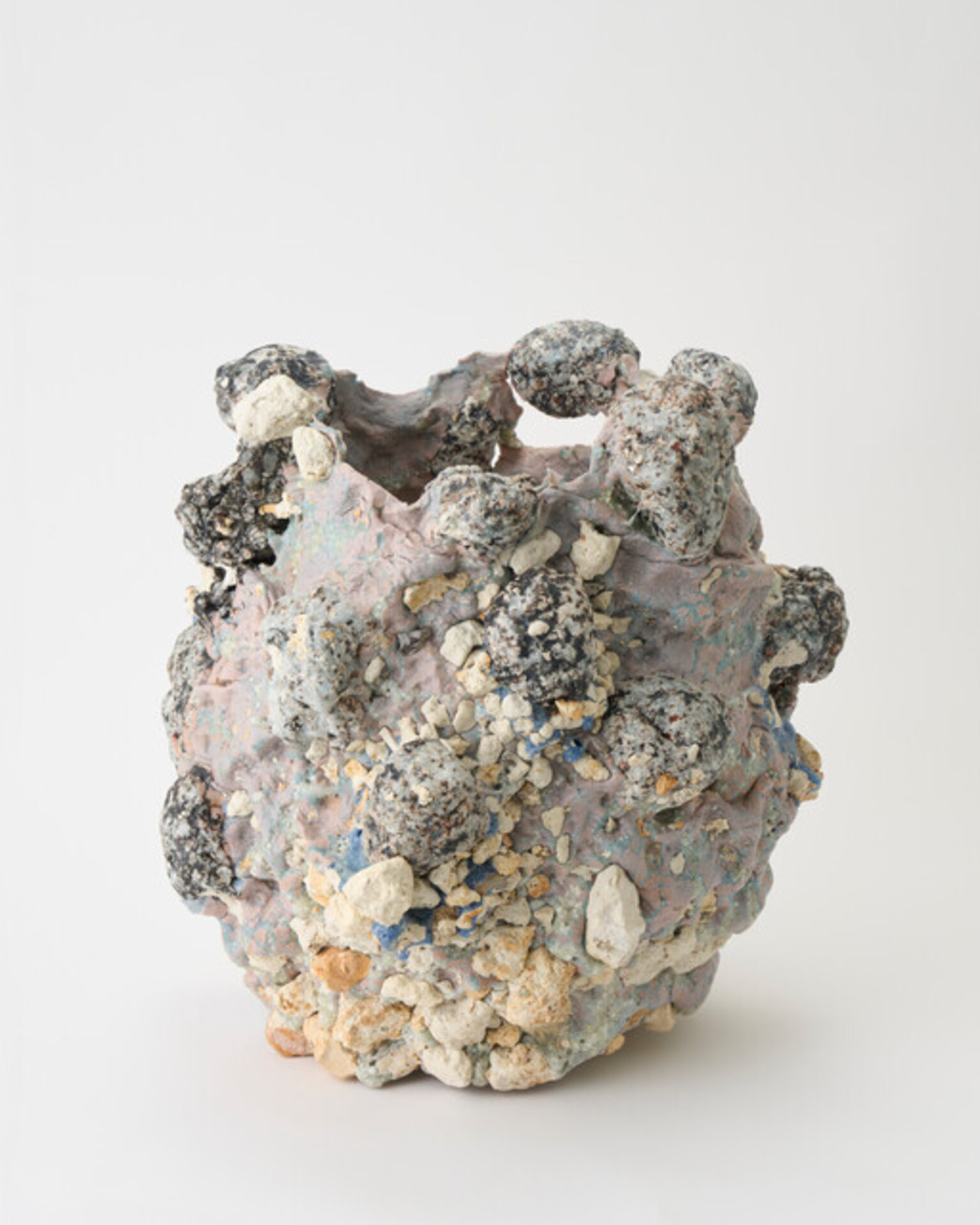Vessel fused with stone