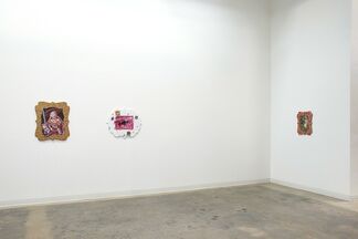 Annelie McKenzie: Man in Canoe and Grizzly, installation view