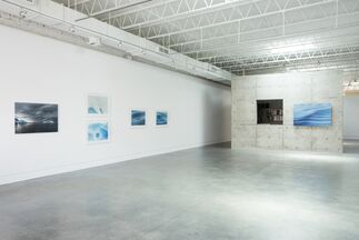 VANISHING ICE: FROM THE ARCTIC TO ANTARCTICA: NEW PHOTOGRAPHY BY PENNY ASHFORD, installation view
