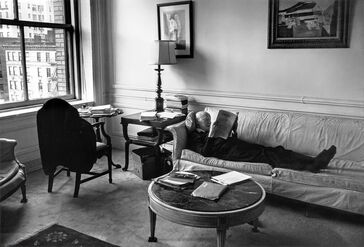 Miriam Berkley, ‘Isaac Bashevis Singer at home on his sofa looking at a book, A PICTURE HISTORY OF CHESS’, 1983