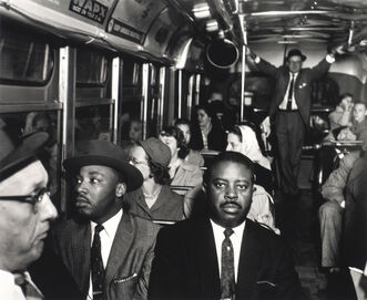 Ernest Withers, ‘Dr. Martin Luther King Jr. and Rev. Ralph Abernathy ride on one of the first desegregated buses, Montgomery, AL, Dec 21, 1956’, 1956