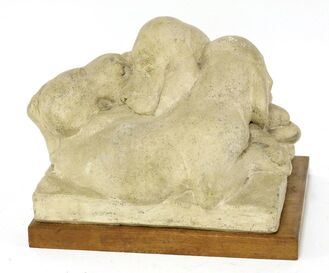 Barbara Tribe, ‘Red Setter Puppies', baked clay, on a wooden plinth’