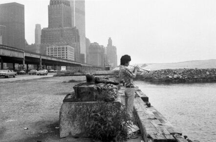 Martha Cooper, ‘Man Playing (or Practicing) Horn Along Hudson, Trade Towers in Distance, Lower East Side, New York, NY’, 1978-1980