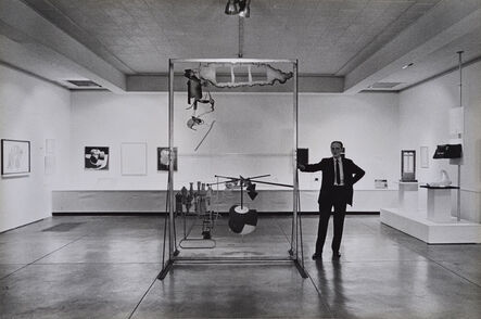Julian Wasser, ‘Marcel Duchamp standing with The Large Glass, Duchamp Retrospective, Pasadena Art Museum,’, 1963