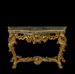 Console in carved, inlaid and gilded wood, top with curvy outline in greek Verde Antico marble edged with Giallo Antico marble