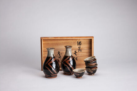 Shōji Hamada, ‘Sake cup and decanter (set of 7), tenmoku, kaki, and nuka glaze with finger wipe decoration’, N/A