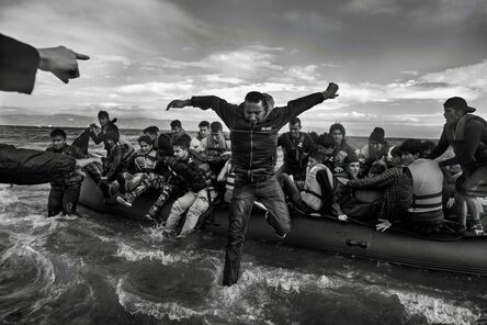 Ashley Gilbertson, ‘Volunteers help refugees, primarily from Syria, Iraq and Afghanistan, disembark on the island of Lesbos, Greece, near Turkey.’, 2016