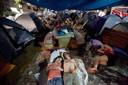 Tali Mayer, ‘Activists lie in a tent camp on Rothschild Boulevard, a central avenue in Tel Aviv. The camp was erected in protest of the rising housing prices. The initiative ignited a wave of mass protests for social justice which lasted for several months. July, 2011’, 2011