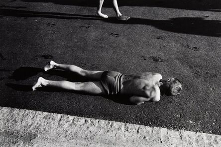 Will McBride, ‘Boy Warming His Stomach on Asphalt, Berlin’, 1956