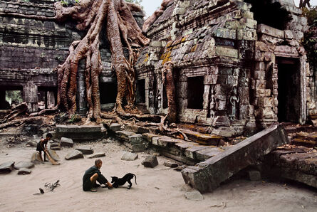 Steve McCurry, ‘Man with Dog at Ta Prohm Temple ’, 1999