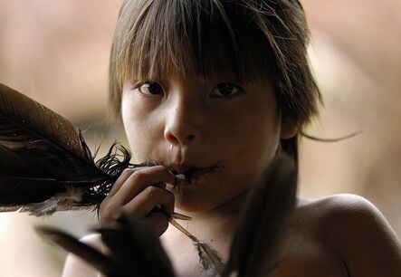 Attila Lorant, ‘Young Yanomami Child playing a Game with a Feather’, 2005