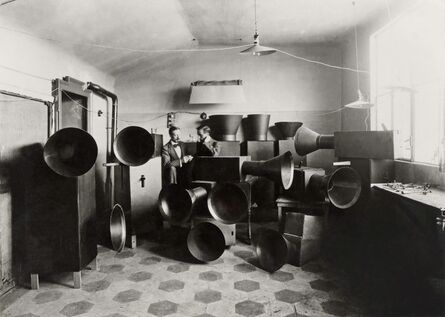 Unknown Artist, ‘Luigi Russolo and his assistant Ugo Piatti in his studio with the intonarumori (noise machines), Milan’, 1914-1915
