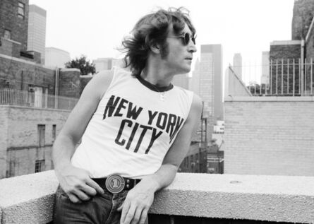 Bob Gruen, ‘John Lennon wearing NYC t-shirt and leaning on rooftop, New York City’, 1974