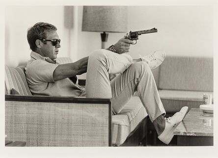 John Dominis, ‘Steve Mcqueen Aims a Pistol in His Living Room, CA (printed 2014)’, 1963