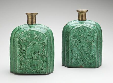 ‘Pair of Pilgrim Bottles with Molded Floral and Figural Motifs; Iran’, Early 17th century