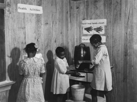 Marion Post Wolcott, ‘Gladys Crimer drying her hands on a paper towel and Berenice Mathis and Edna Law washing theirs in the cleanup corner in the second- and thirtd-grade schoolroom, near Montezuma, Georgia’, 1939