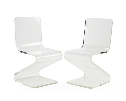 ‘A pair of Lucite zig-zag chairs’