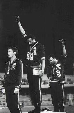 John Dominis, ‘American Track and Field athletes Tommie Smith and John Carlos, First and Third Place Winners in the 200 Meter Race, Protest with the Black Power Salute’, 1968