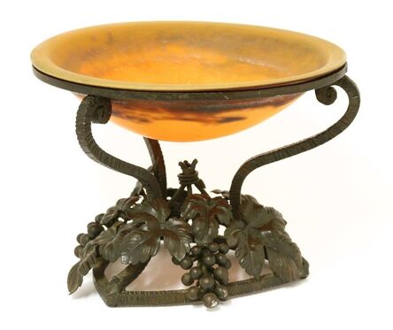 ‘A mottled orange glass bowl’