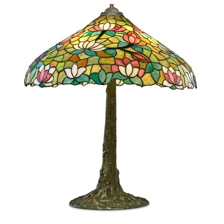 Chicago Mosaic Lamp Co., ‘Table lamp with lotus shade and tree trunk base’, 1910s