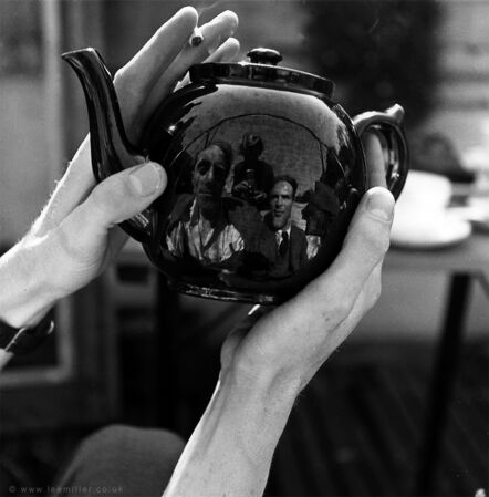 Lee Miller, ‘Portrait of Leslie Hurry in a teapot, including Lee Miller and unknown, Vale Lodge, Vale of Heath, Hampstead, London, England’, 1943