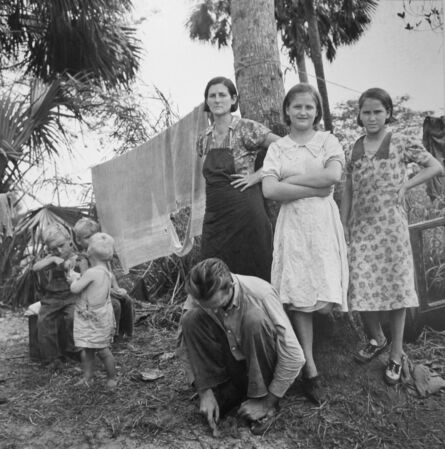 Marion Post Wolcott, ‘Migrant family from Missouri camping out in cane brush. One woman said, "We ain't never lived like hogs before but we sure does now." Canal Point, Florida’, 1939