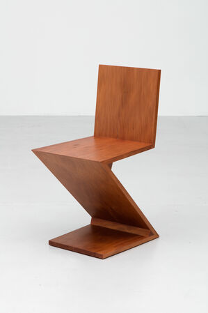 A Zig-Zag Chair designed by Gerrit Rietveld in 1934 and reproduced using 45,910 year-old swamp kauri wood in 2015