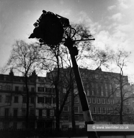 Lee Miller, ‘'Fashion Note: Lamp posts to be worn cock-eyed this year in Belgravia, London, England’, 1940