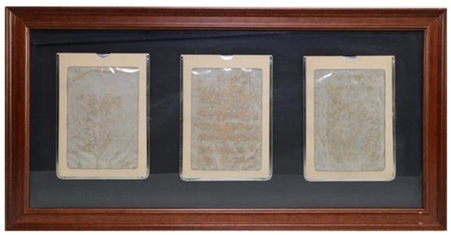 Three magic slate boards mounted on grey card