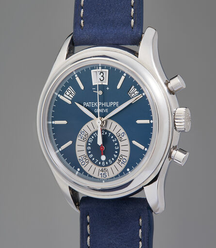 Patek Philippe, ‘A very fine and rare platinum annual calendar chronograph wristwatch with blue dial, original Certificate of Origin, and presentation box’, 2011