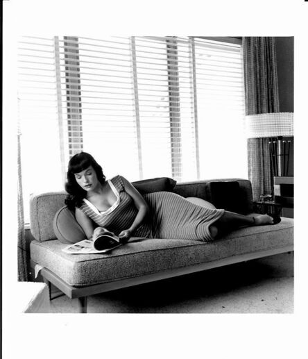 Bunny Yeager, ‘Bettie Page on Couch-Coral Gable FL’, 1954