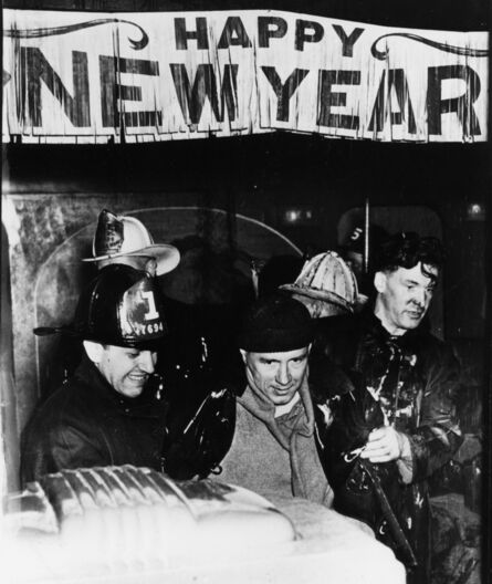 Weegee, ‘‘Tavern of ground floor of burning building at 80 Greenwich St. is the shelter for firemen overcome by smoke New Years Eve. Customers also had a hot time.”, January 2nd 1945’, 1945
